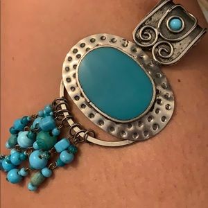 Turquoise and silver necklace pendant